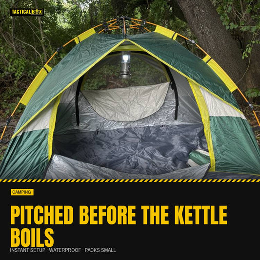 Quick Popup Tent pitched in woodland with the door open