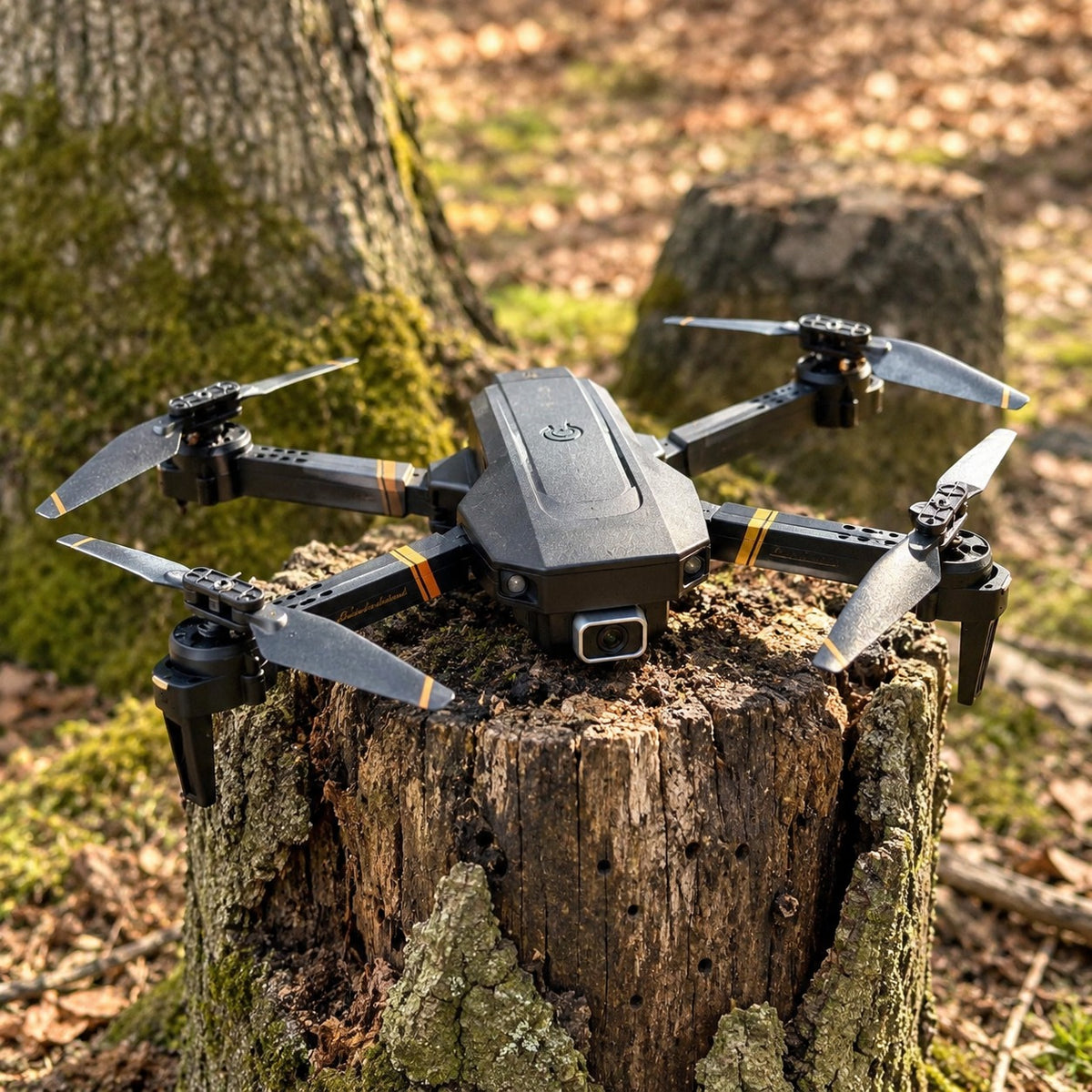 TacRight RC Drone unfolded on a tree stump in open woodland