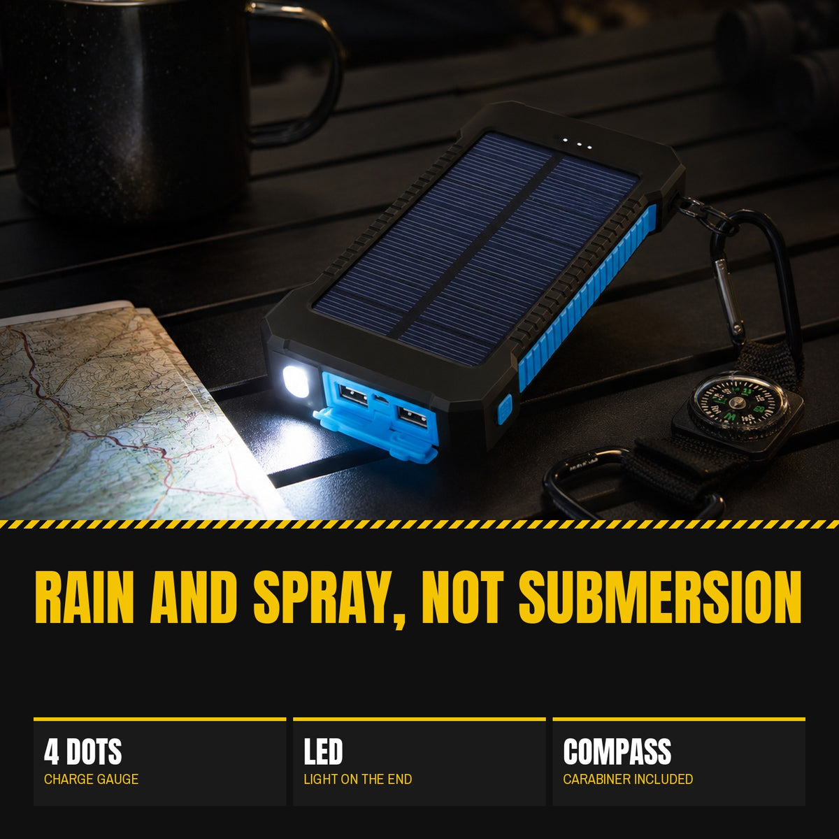 Waterproof Solar Charger on a camp table after dark with its side LED lighting a map and a mug