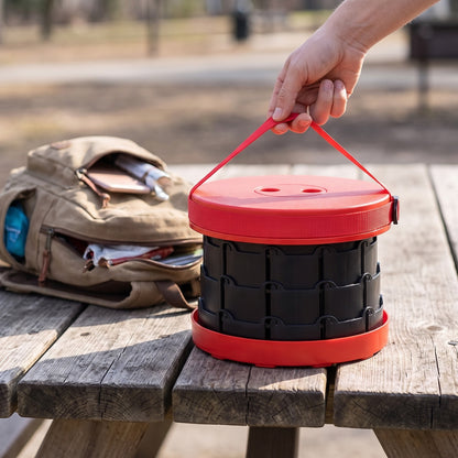 Retractable Camping Stool collapsed and carried by its strap