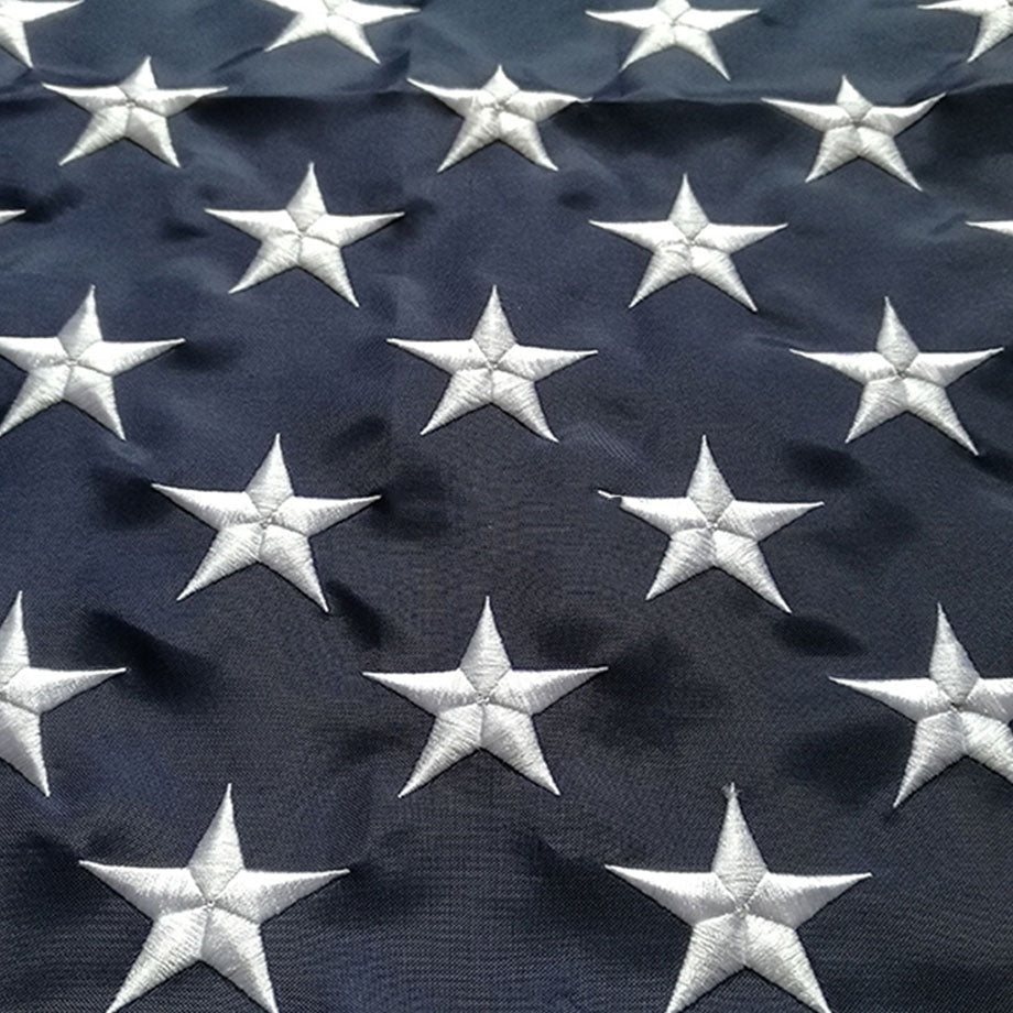 Close view of the embroidered star field on the blue canton