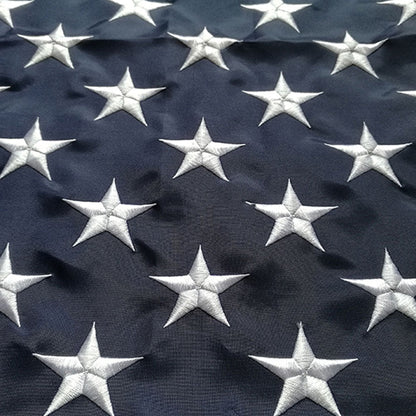Close view of the embroidered star field on the blue canton