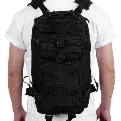 Tactical backpack photographed outdoors