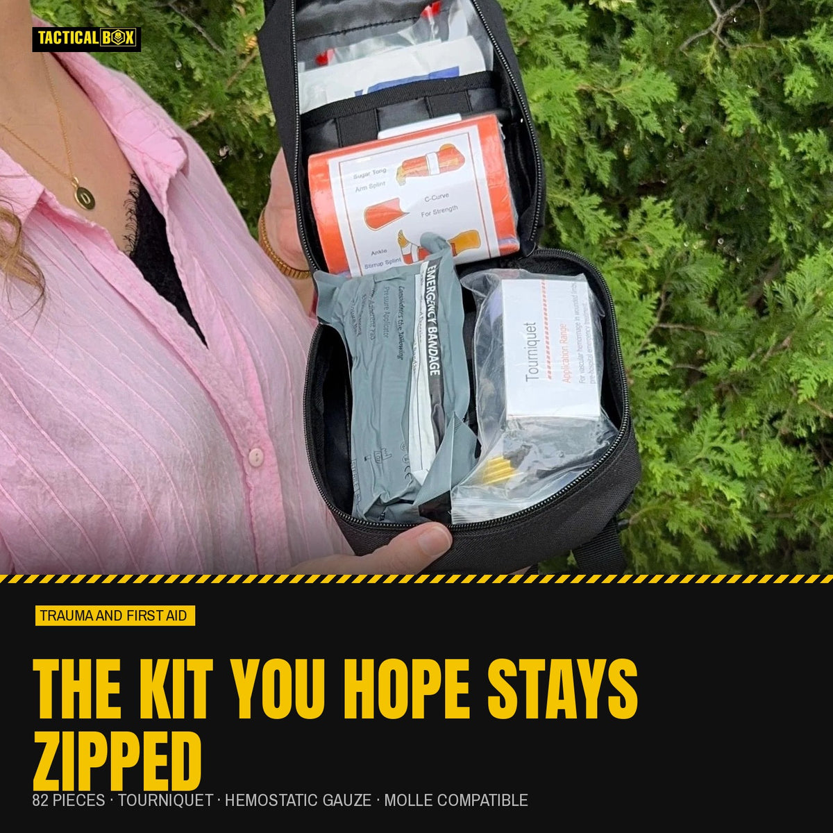 Trauma First Aid Kit held open outdoors: the kit you hope stays zipped