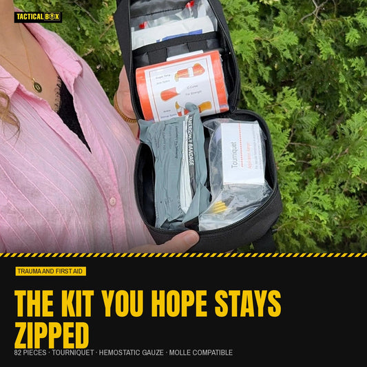 Trauma First Aid Kit held open outdoors: the kit you hope stays zipped