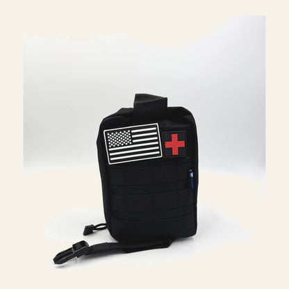 Trauma First Aid Kit front view, US flag and red cross patches visible